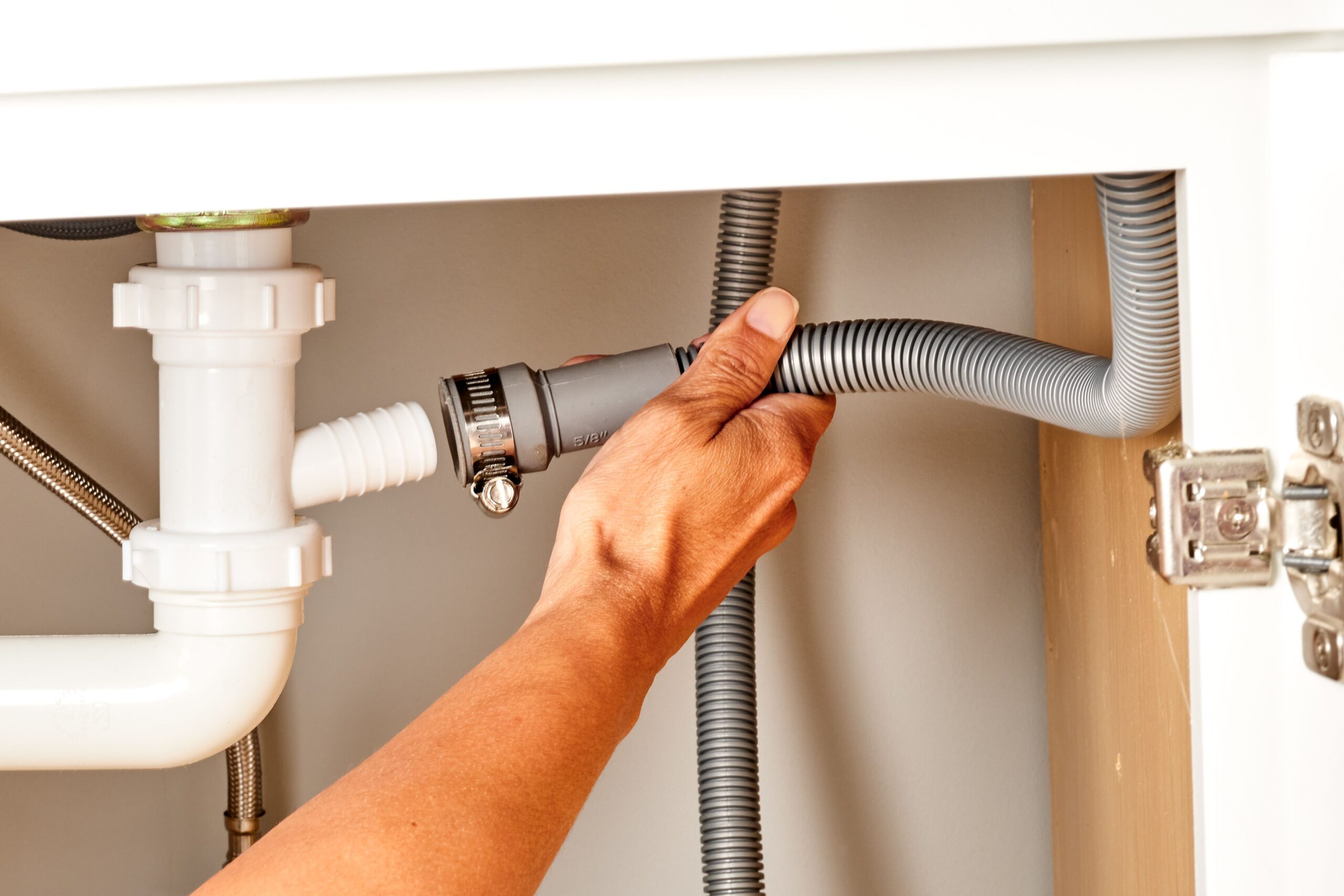 how to unblock a dishwasher